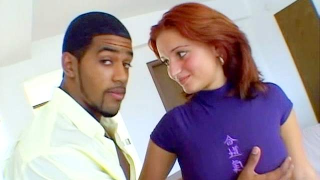 Redhead babe being fucked in the interracial scene