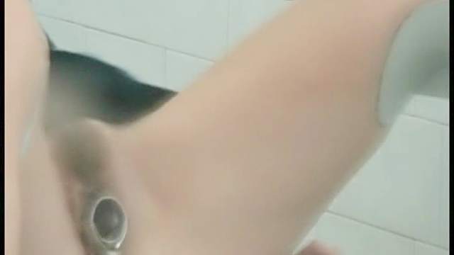 Cute beauty with trimmed pussy in the medical chair