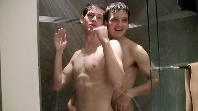 Gay brunette is fucking his friend in the shower