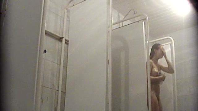 Spicy wet babe is taking shower in the voyeur vid