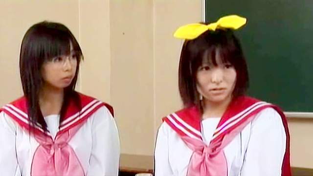 Three Asian schoolgirls are sucking with smiles