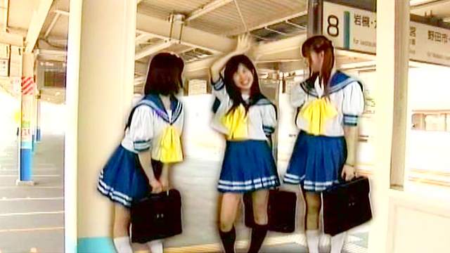 Three Asian schoolgirls are sucking with smiles