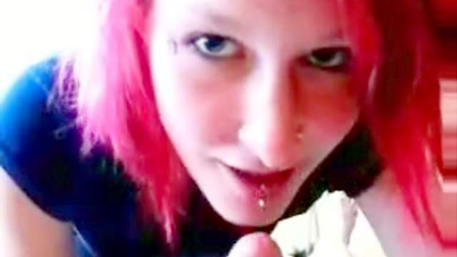 Redhead chick emo is sucking a dick