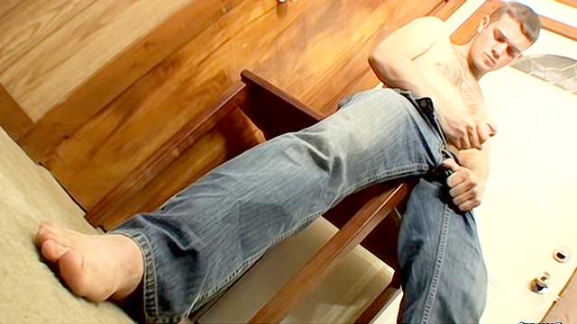 Sexy gay with cute face is masturbating his dick