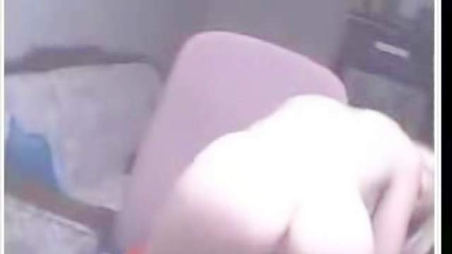 Cute slender blonde is masturbating on the webcam