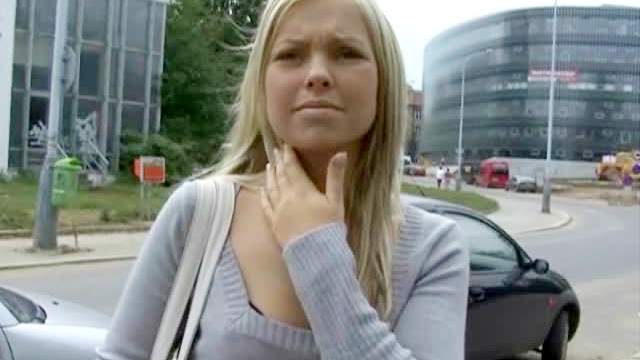 Girl in grey sweater gives handjob