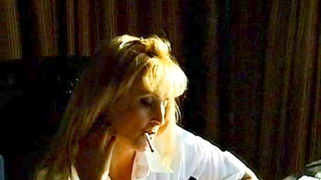 Horny milf masturbates while smoking in fetish video