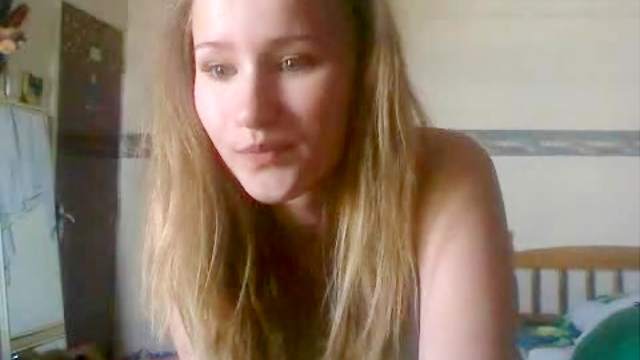Slender teen performs a striptease on webcam
