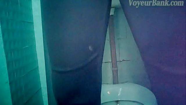 Hidden cam is featuring hot pissing babe in a toilet