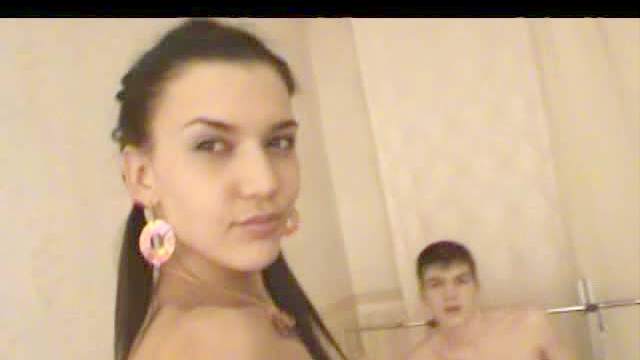 Hottie in pigtails sucks her man