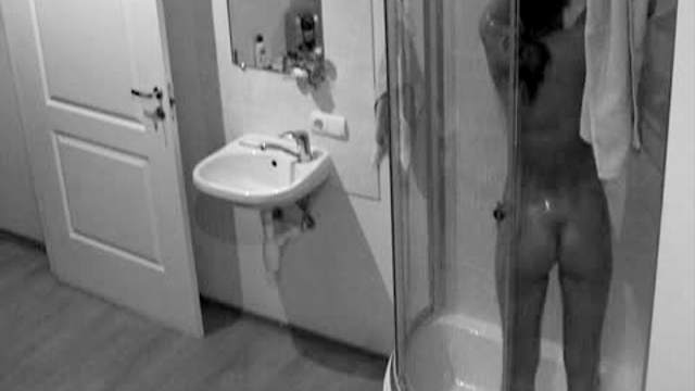 Leggy teen showers on hidden cam