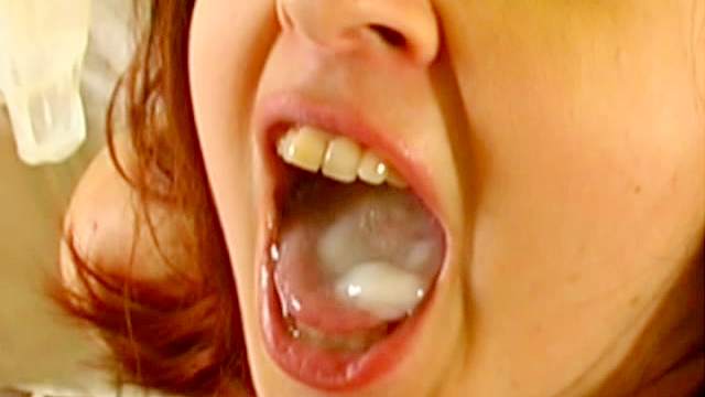 Dirty brunette slut eats cum from a condom