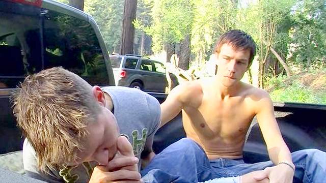 Teens wearing jeans blow their dicks in the back of the van
