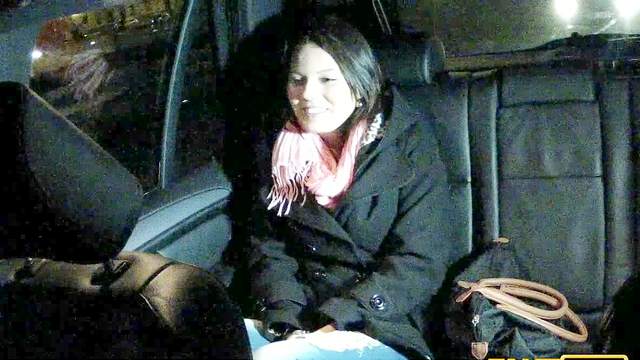 Brunette sucks and mounts cock in the taxi