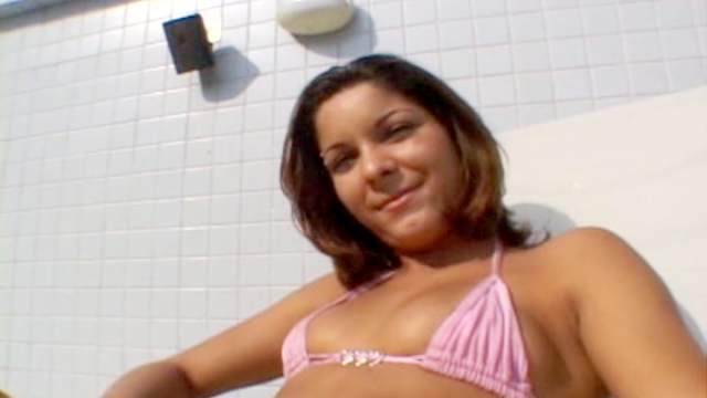 Brazilian tramp in bikini mounts cock outdoors