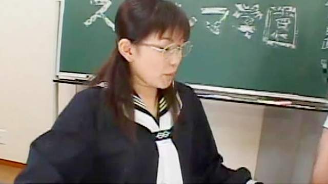 Sweet Asian is sucking dick in the classroom