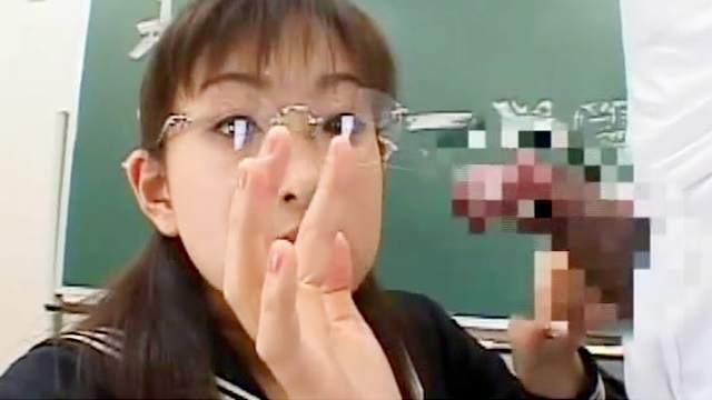 Sweet Asian is sucking dick in the classroom