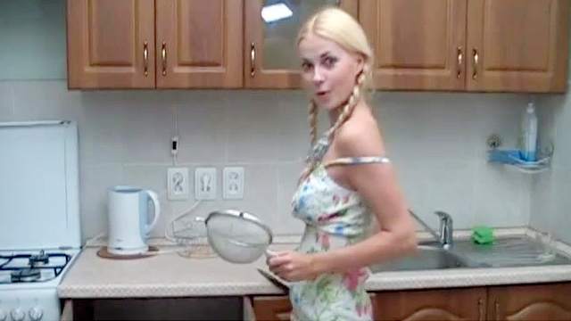 Erica shows her natural boobs in the kitchen