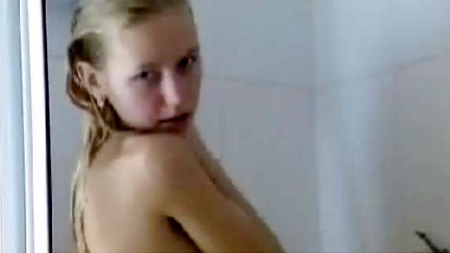 Amateur blonde is taking a shower so sexy