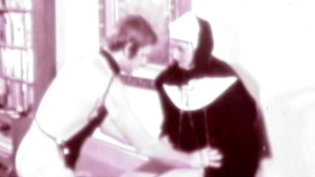 Brunette nun is giving a deep blowjob