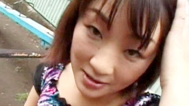 Japanese teen reveals an upskirt of her panties