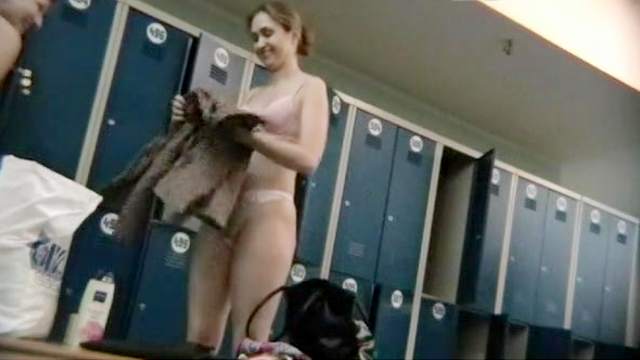 Sexy babe is getting naked in the locker room