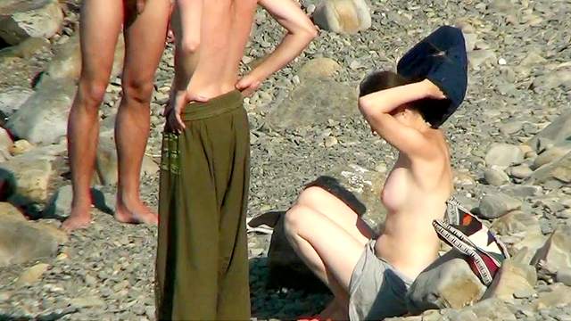 Hot scene with naked people on the beach