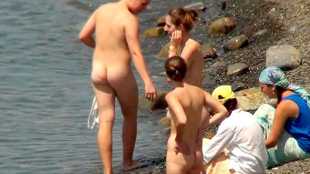 Public beach with sexy naked nudists