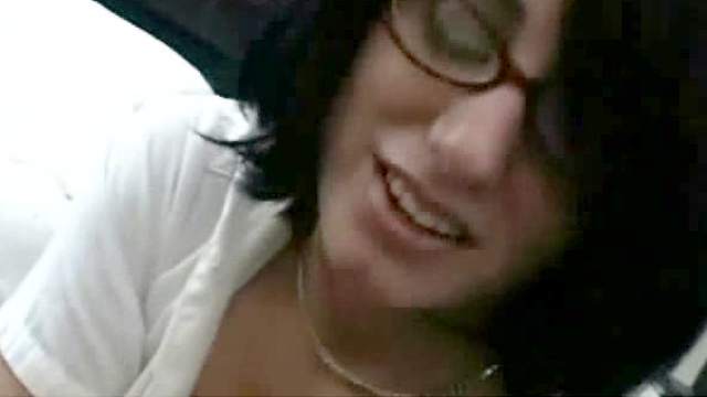 Sexy chick in glasses is sucking a big dick