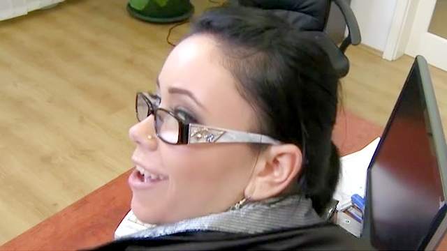 Sweet chick in glasses is giving a blowjob