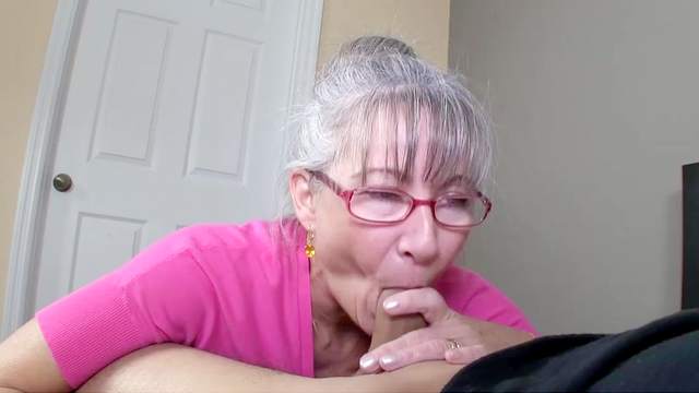 Pretty hot granny is sucking a nice cock