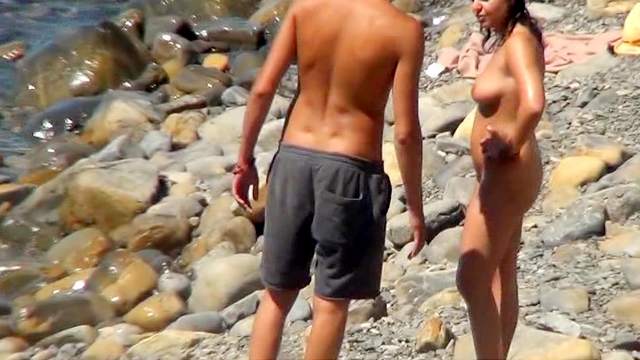 Sexy chick and her friend on the beach