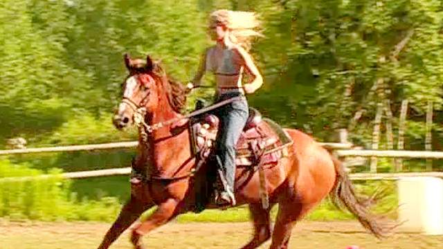 Blonde Ania poses on the horse so sexy