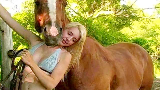 Blonde Ania poses on the horse so sexy