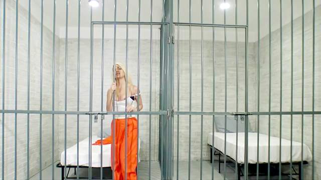 Horny blonde inmate fucks cop in her cell