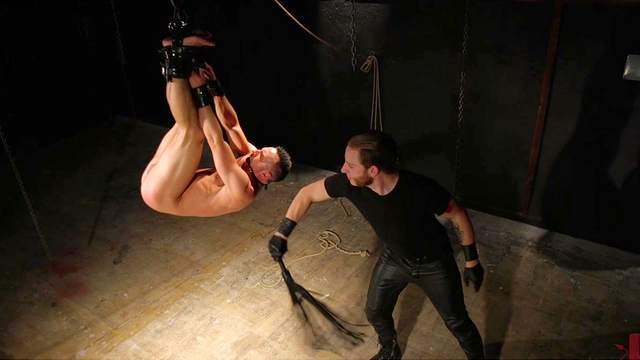 Man endures massive inches down the ass during a full BDSM gay play