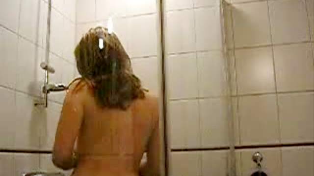 Lovely girl wet in the shower