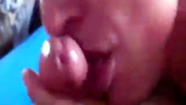 Chick licks his dick all over