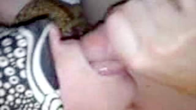 Watch her lick a throbbing cock head