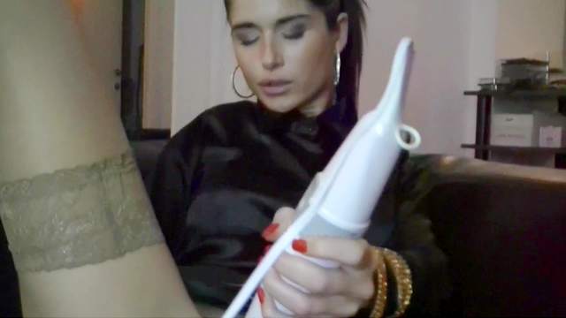 Solo beauty uses huge vibrator on pussy and over the clit