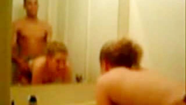 Looking in bathroom mirror during sex
