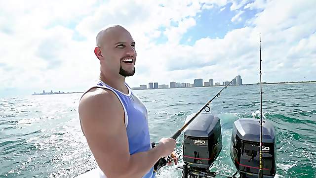 Bald dude works Asian pussy during boat trio