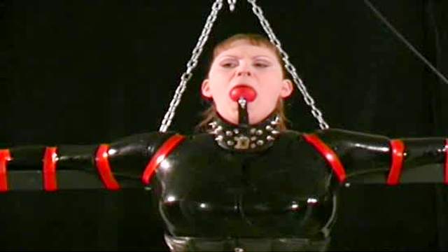 Latex bondage and outfits in dungeon