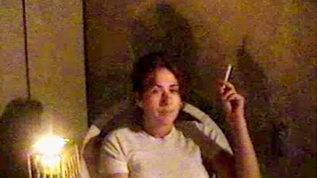 Cute brunette smokes and talks