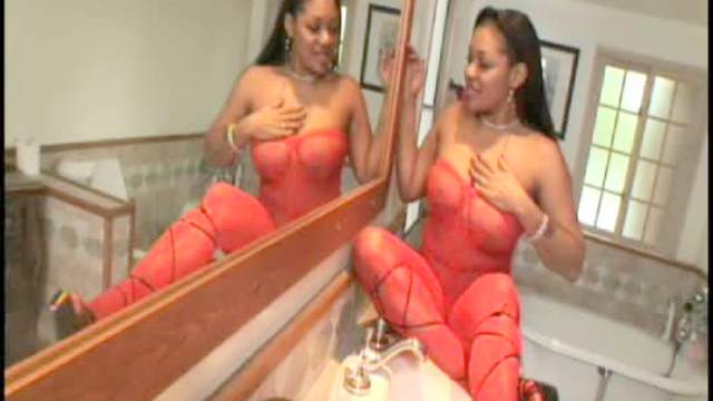 Black girl in red lace blows him