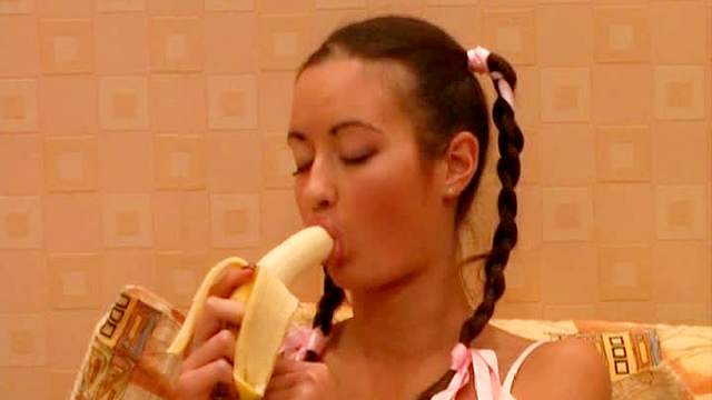 Raunchy teen Valery stuffs a banana in her cunt