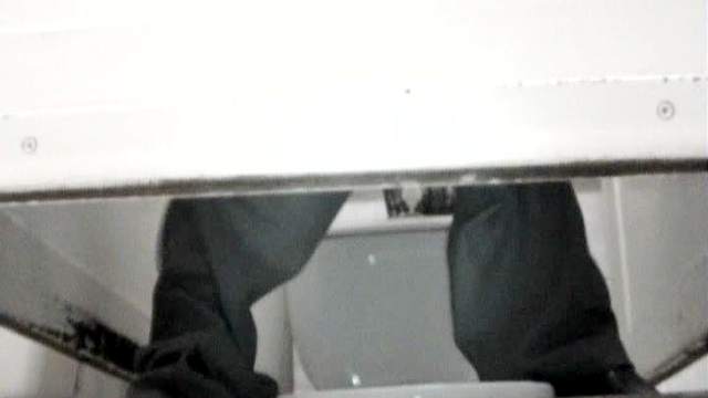 Hidden camera captures bathroom pissing