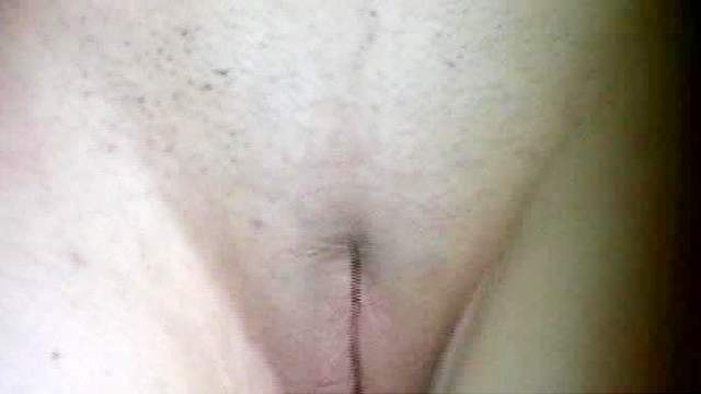 Girl with tampon in pisses in close up