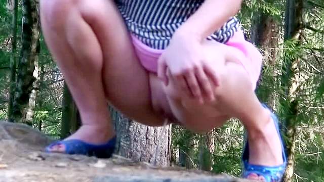 Tube top and skirt slut pisses in woods