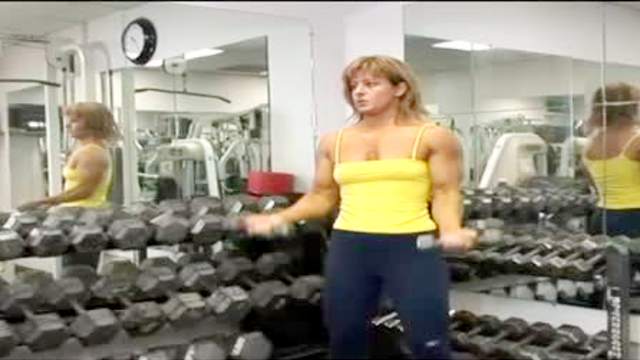 Muscular milf works out and gets laid